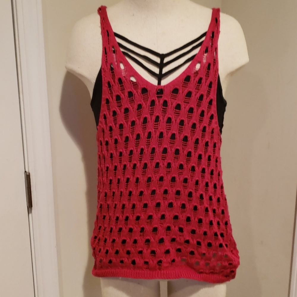 Tank with holes from buckle